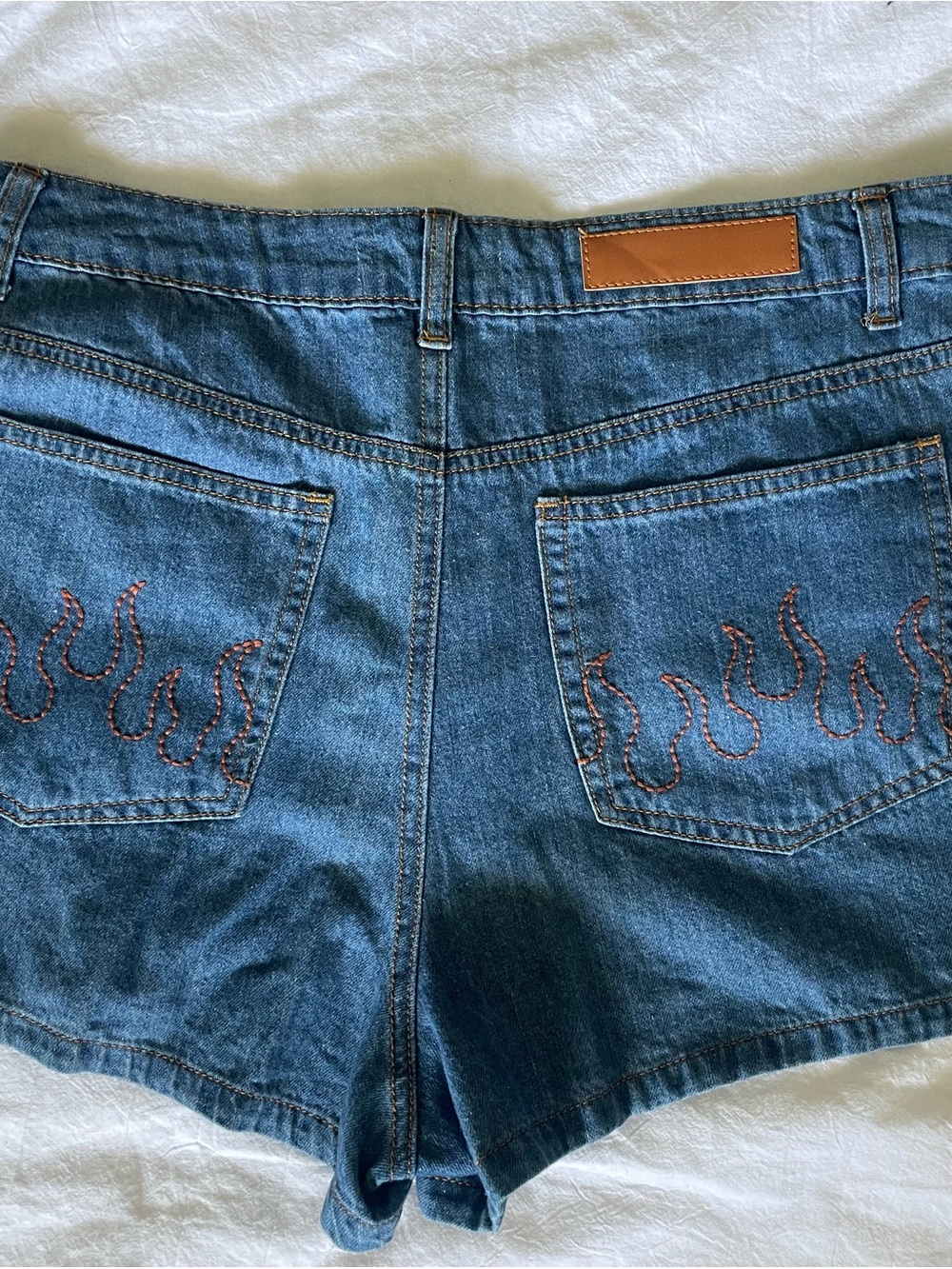 Honey Punch Indigo High-Waist Denim Shorts with flame detail size medium